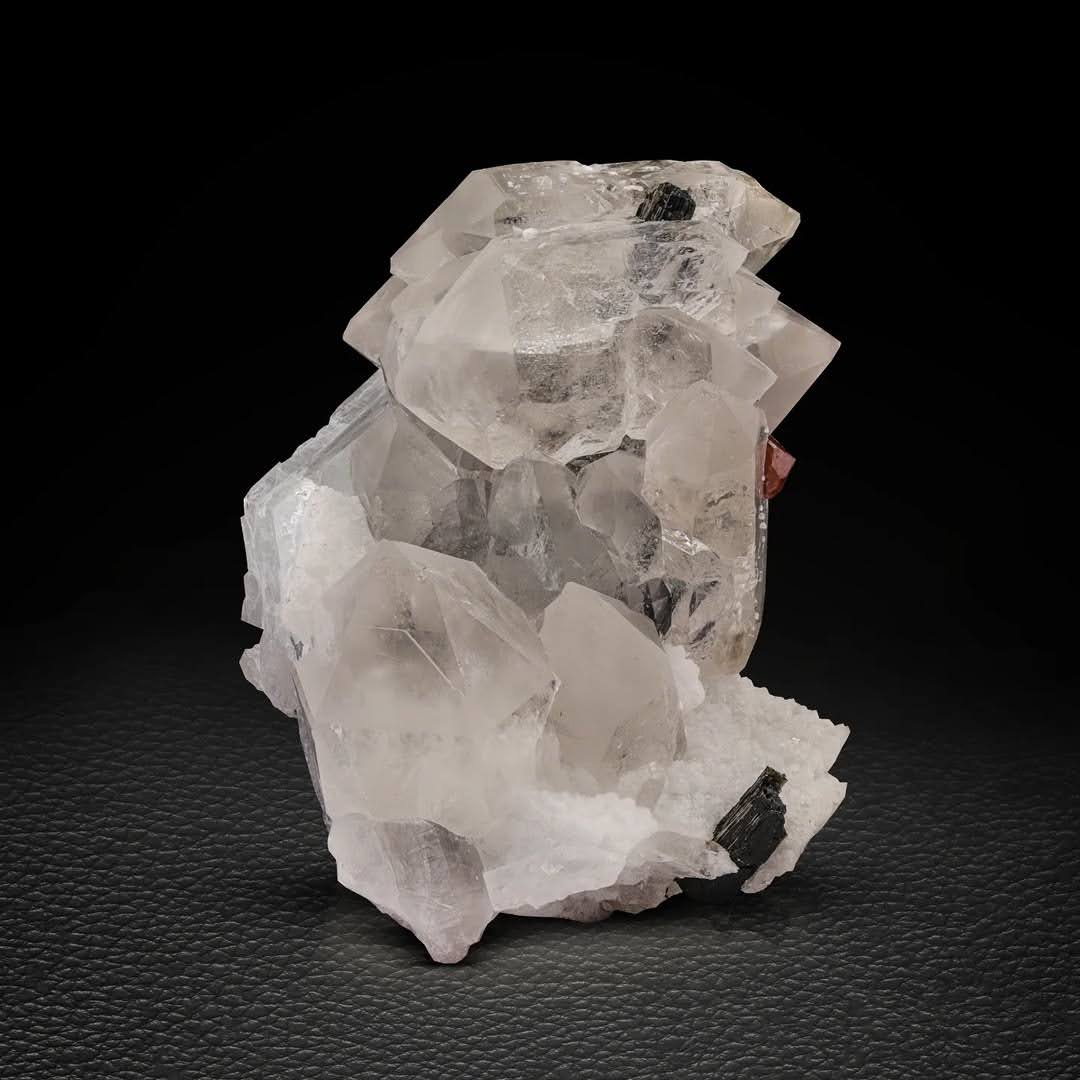 Red Hassonite Garnet crystals on Quartz with Schorl from Pakistan