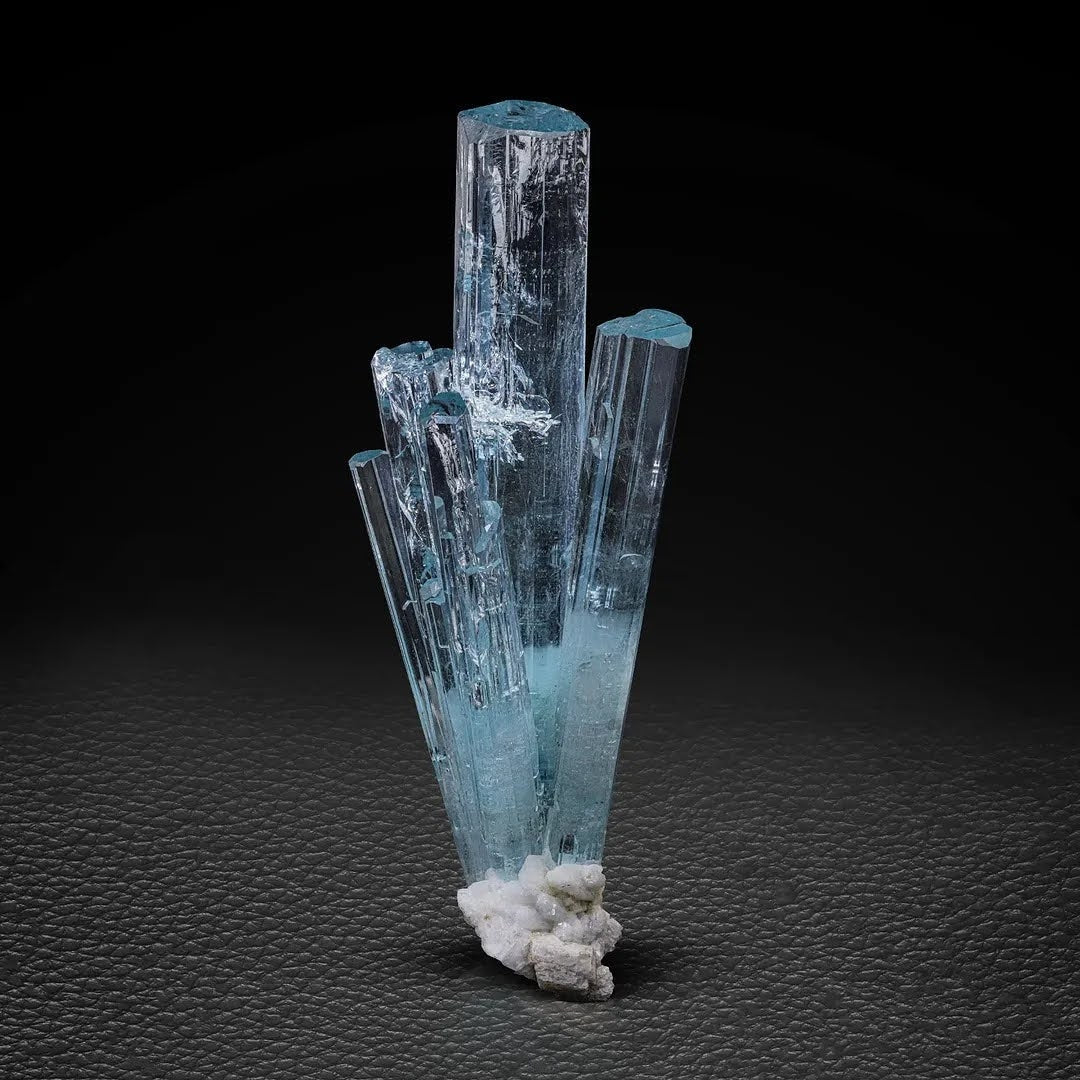 Cluster of Elongated Aquamarine Crystals on Albite from Pakistan