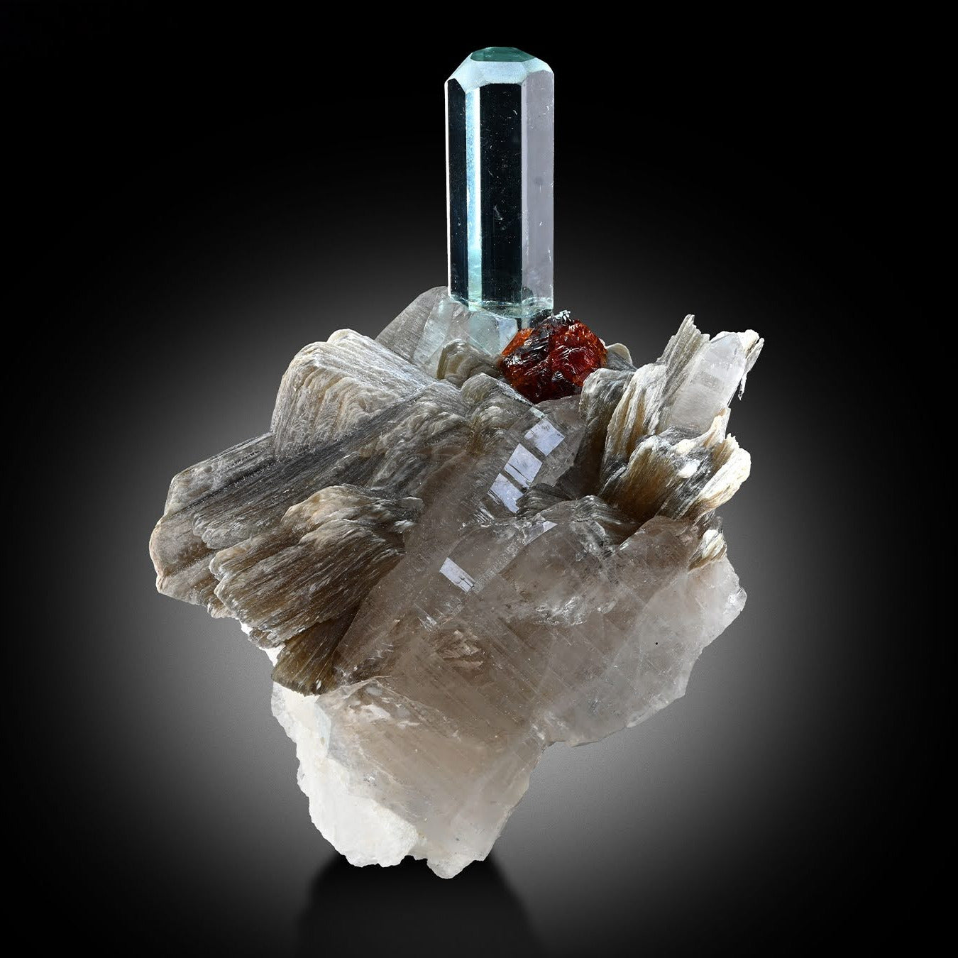Combination of Aquamarine on Smoky Quartz with Spessertine Garnet from Pakistan