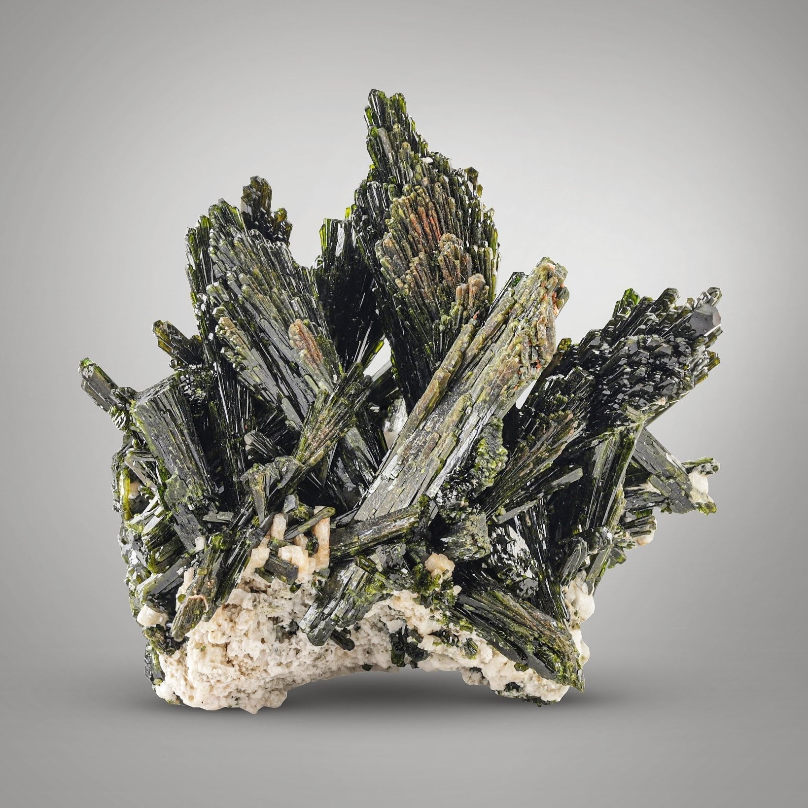 Lustrous forest green color Epidote crystal cluster on Albite matrix from Pakistan