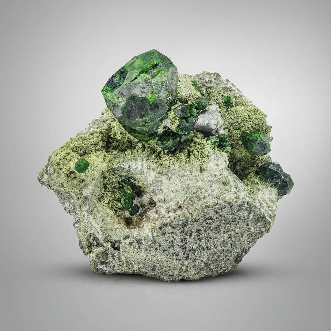 Vibrant Green Demantoid Garnet Isolated Crystals on Matrix from Iran