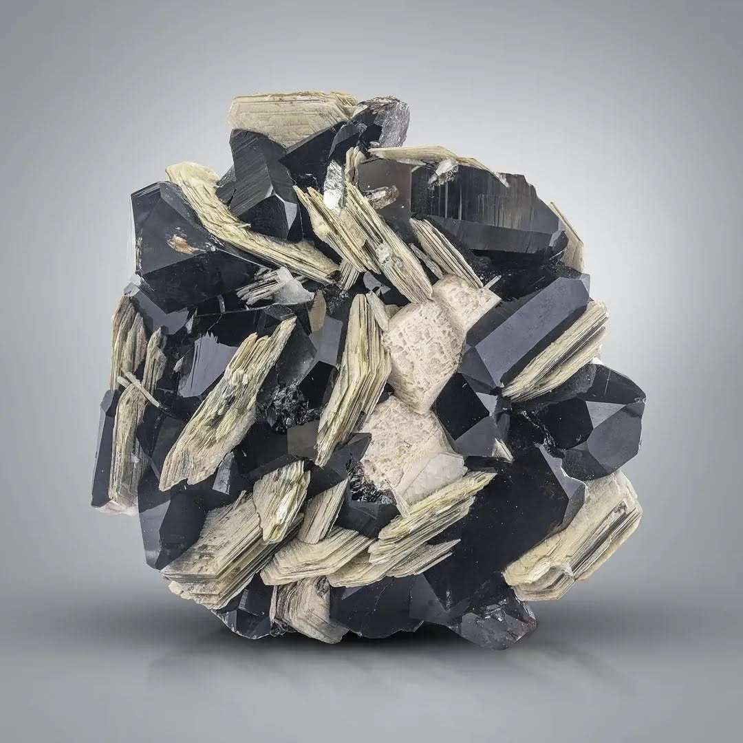 Specimen of Smoky Quartz on Muscovite with Feldspar from Afghanistan