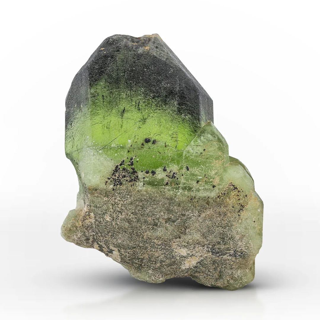 Apple Green Peridot Crystal with Lugwigite-Vonsenite Inclusion from Pakistan