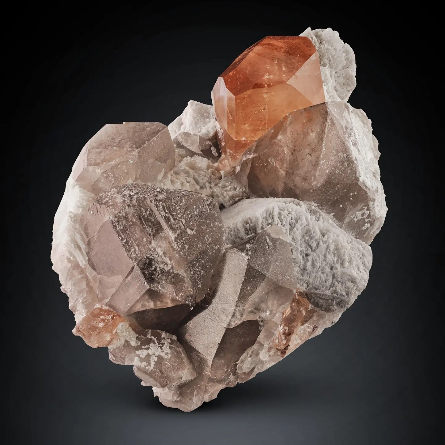 Glassy multi faced gem Champagne Topaz on Smoky Quartz from Pakistan