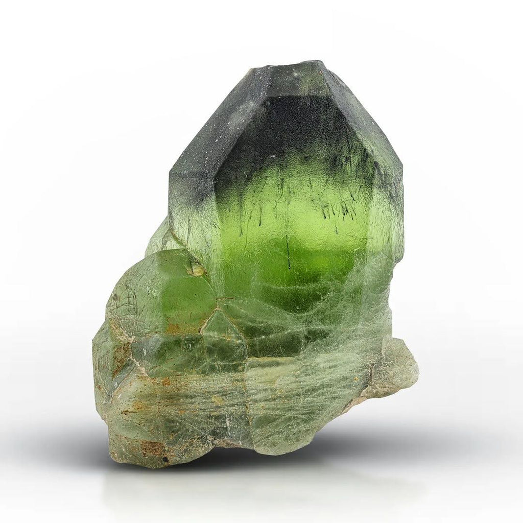 Apple Green Peridot Crystal with Lugwigite-Vonsenite Inclusion from Pakistan