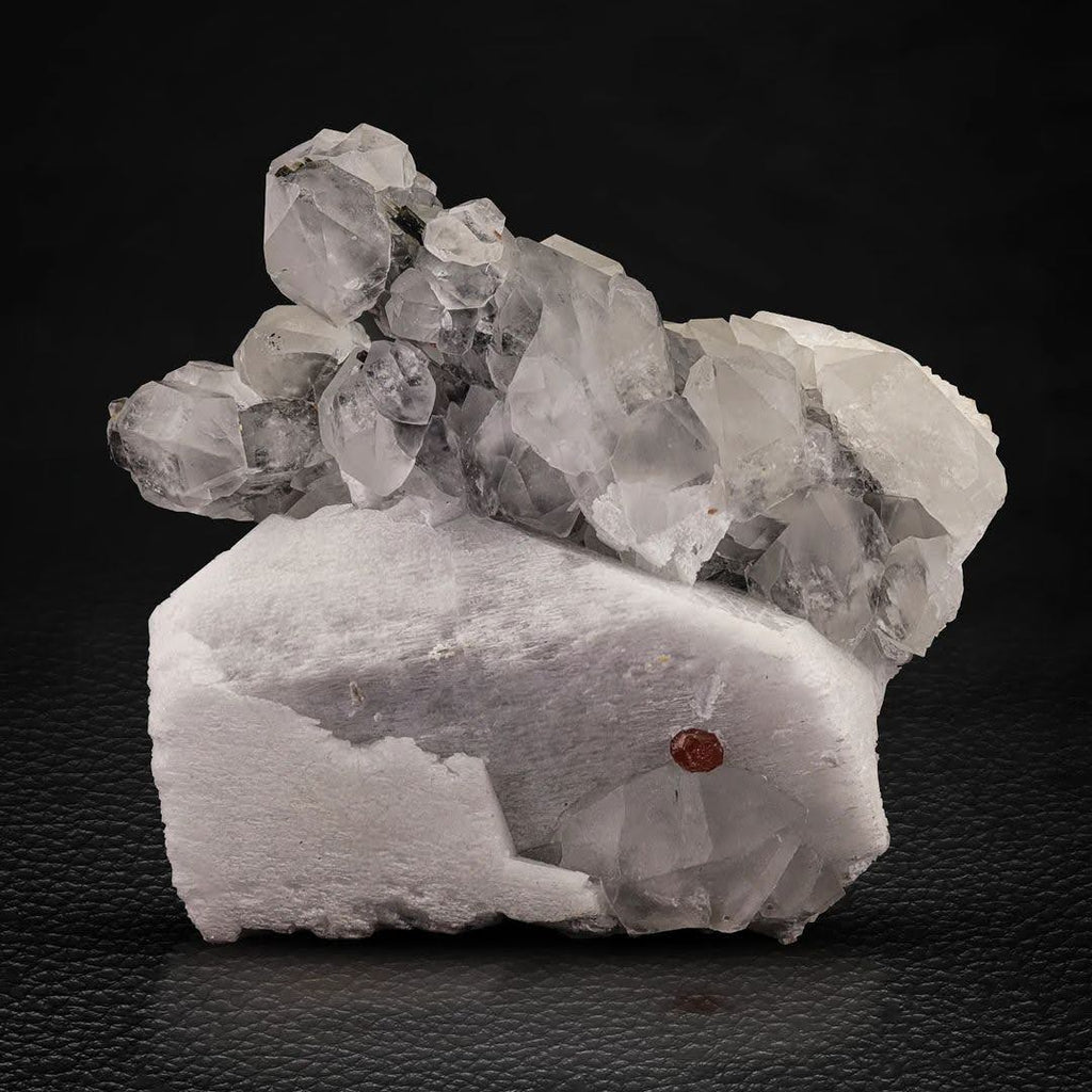 isolated double terminated Quartz on Feldspar with Garnet from Pakistan