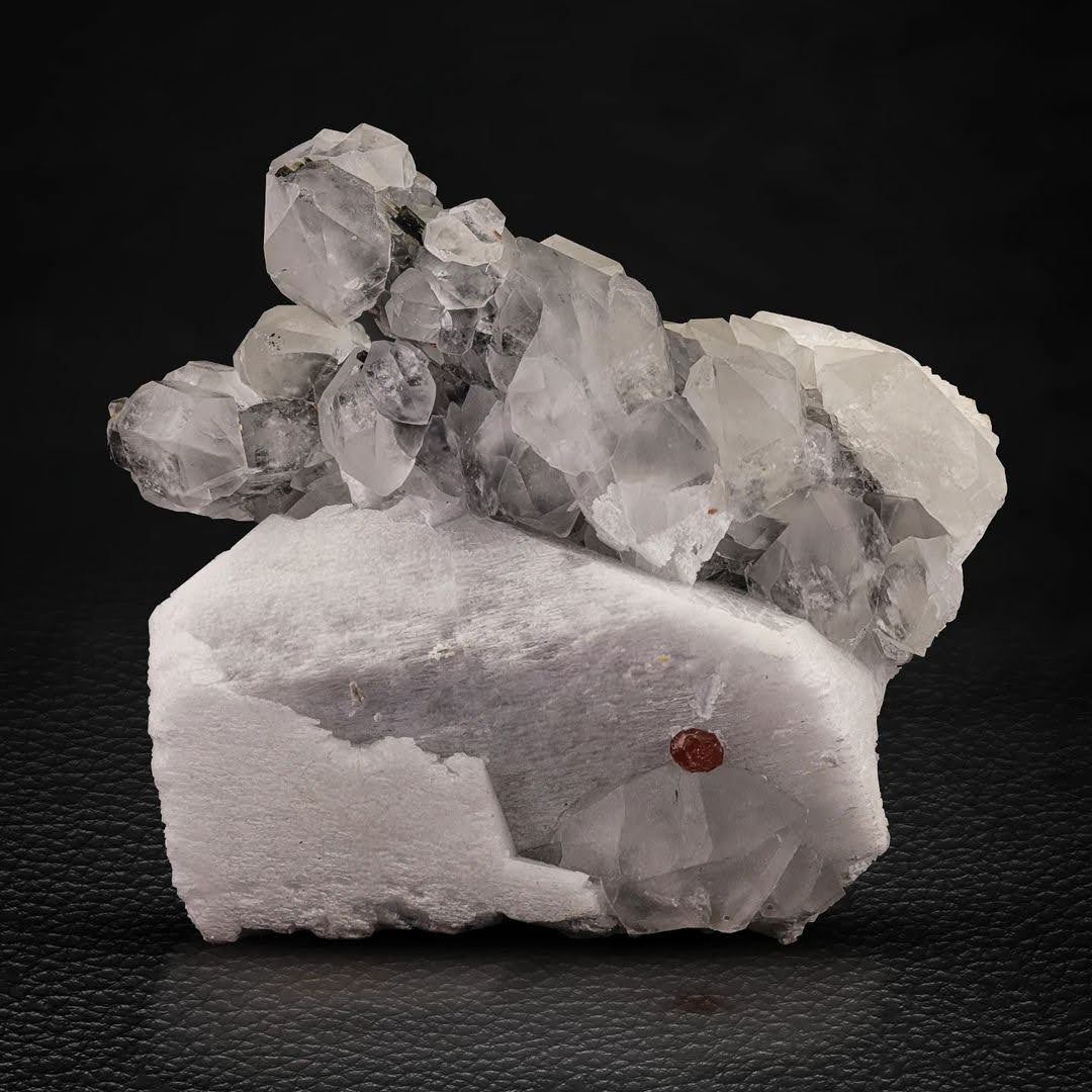 isolated double terminated Quartz on Feldspar with Garnet from Pakistan