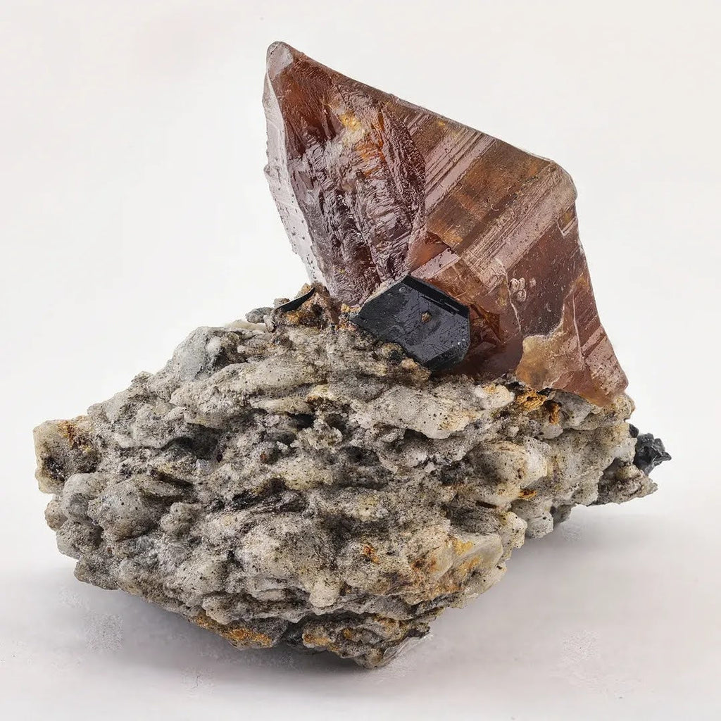 Double Terminated Parisite Crystal with Ilmenite on Matrix from Pakistan