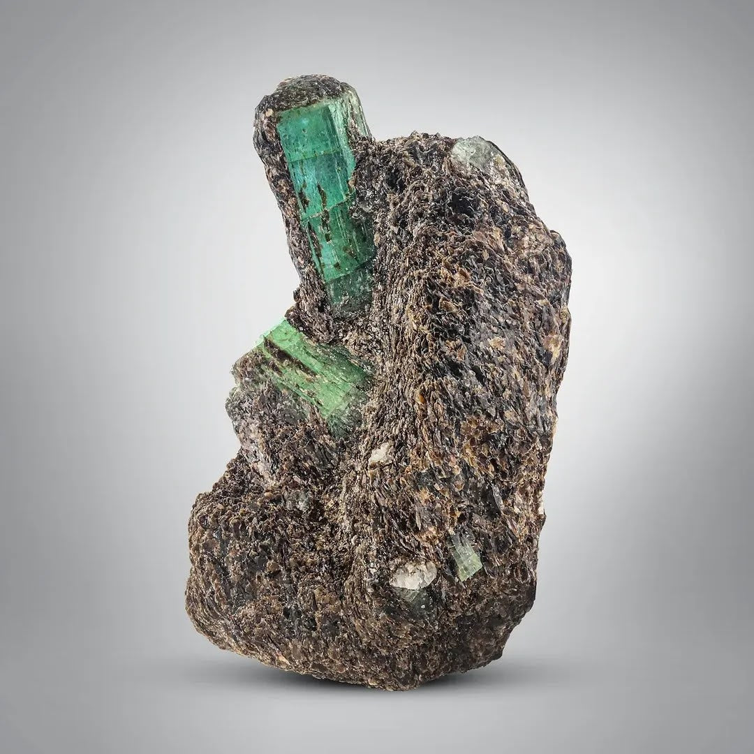 Green Emerald crystals Perched on Brownish Mica Matrix from Pakistan