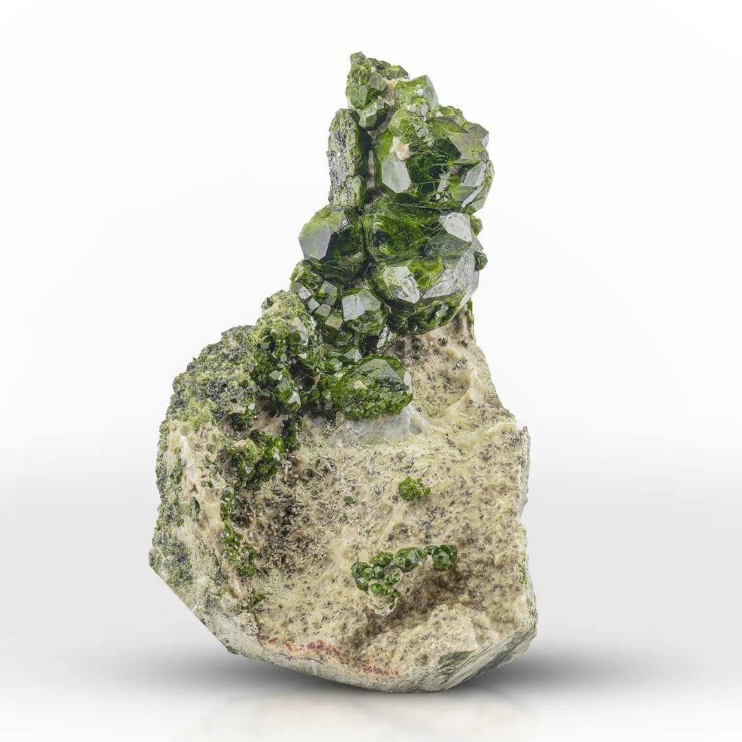 Sculptural of Vibrant Green Demantoid Garnet on Matrix from Iran