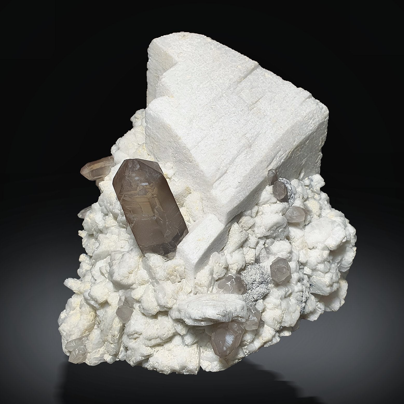 cabinet size piece of Microcline Feldspar with Smoky Quartz from pakistan