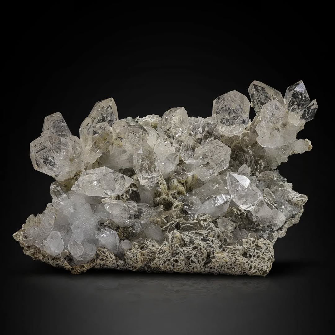 Pointed Terminated Diamond Quartz Cluster on Calcite from Pakistan