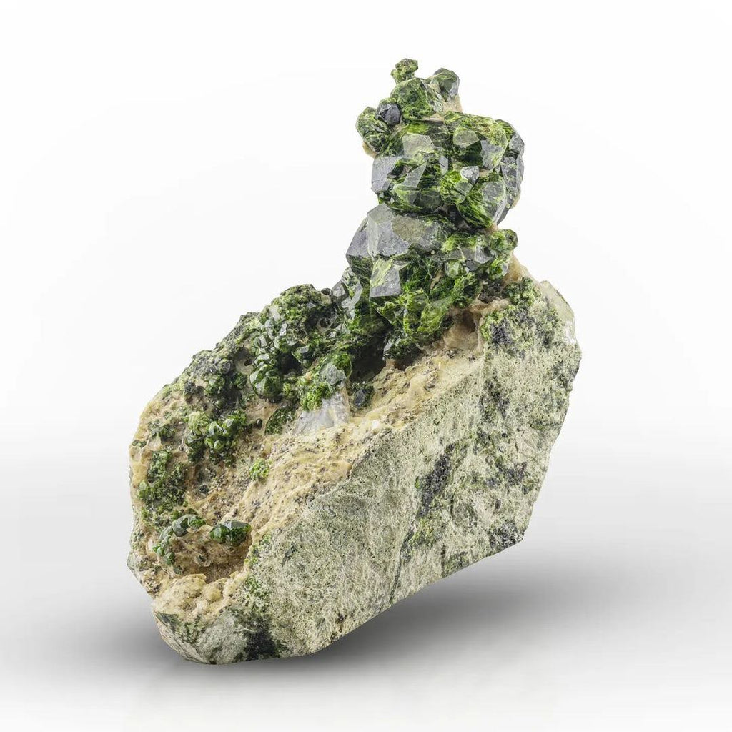 Sculptural of Vibrant Green Demantoid Garnet on Matrix from Iran