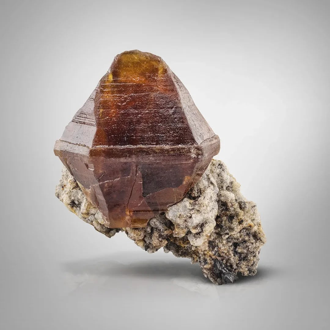 Double Terminated Parisite Crystal with Ilmenite on Matrix from Pakistan