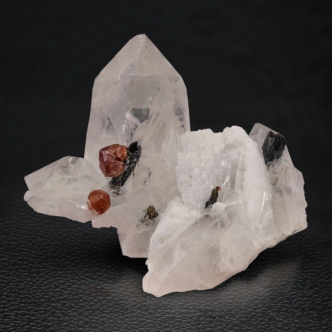 Orangey Red Hassonite Garnet on Quartz with Schorl from Pakistan