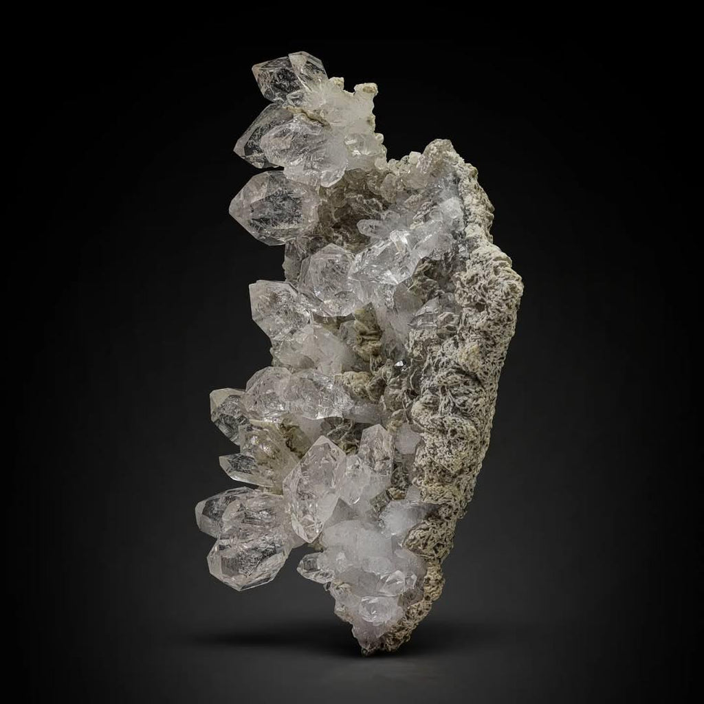 Pointed Terminated Diamond Quartz Cluster on Calcite from Pakistan