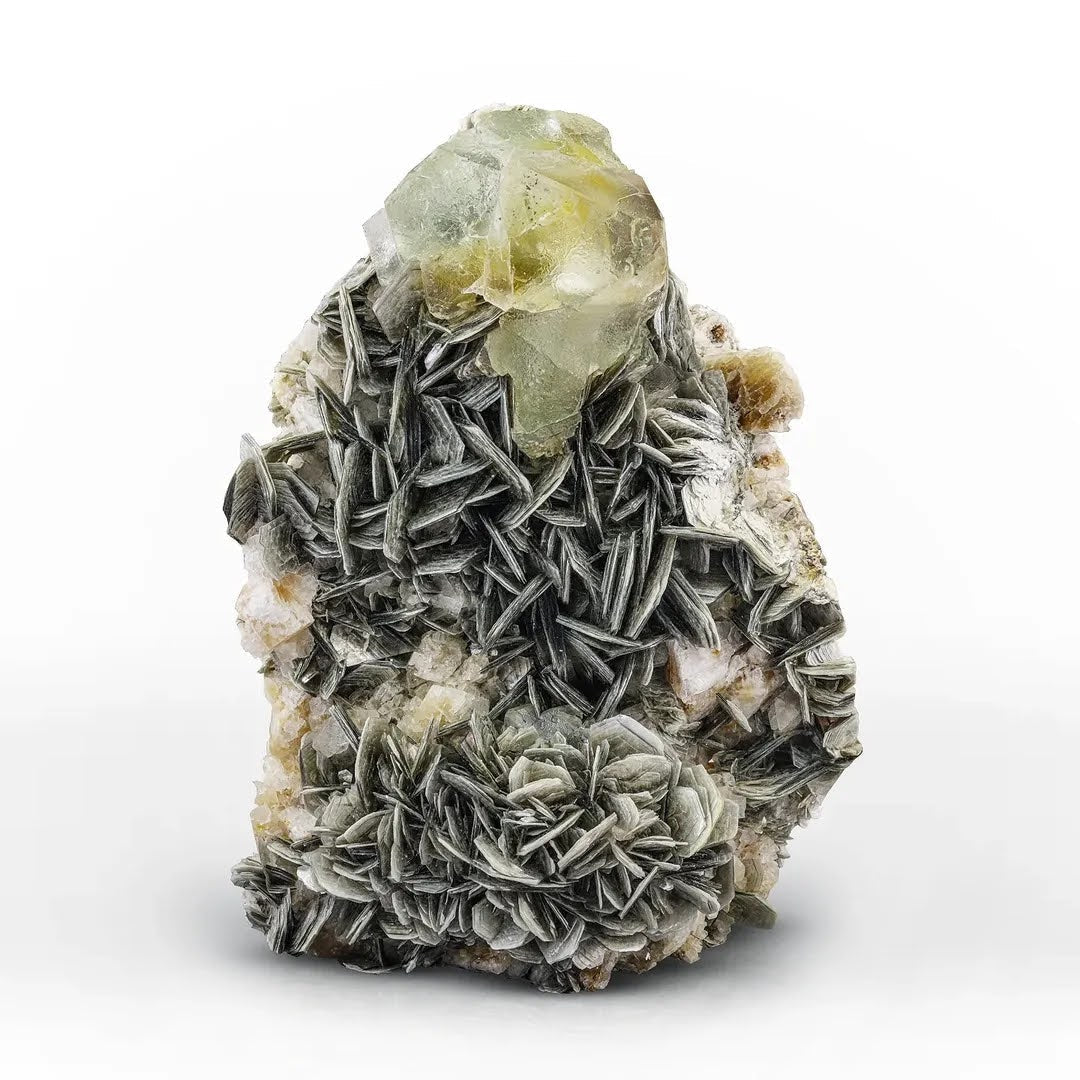 Green Octahedral Fluorite Crystal Perched on Muscovite from Pakistan