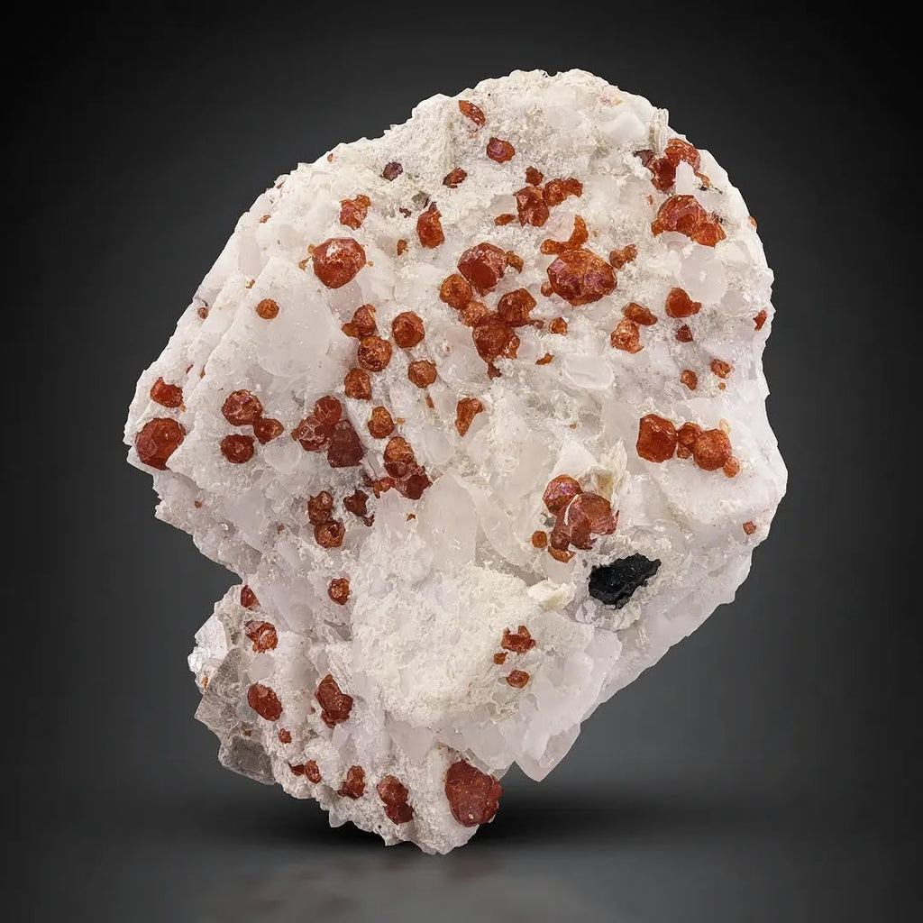 Red Hassonite Garnet crystals on White Albite from Pakistan