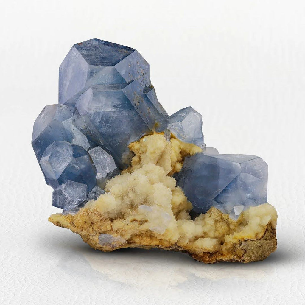 Cluster of Vibrant Blue Celestite Crystals on Calcite from Afghanistan