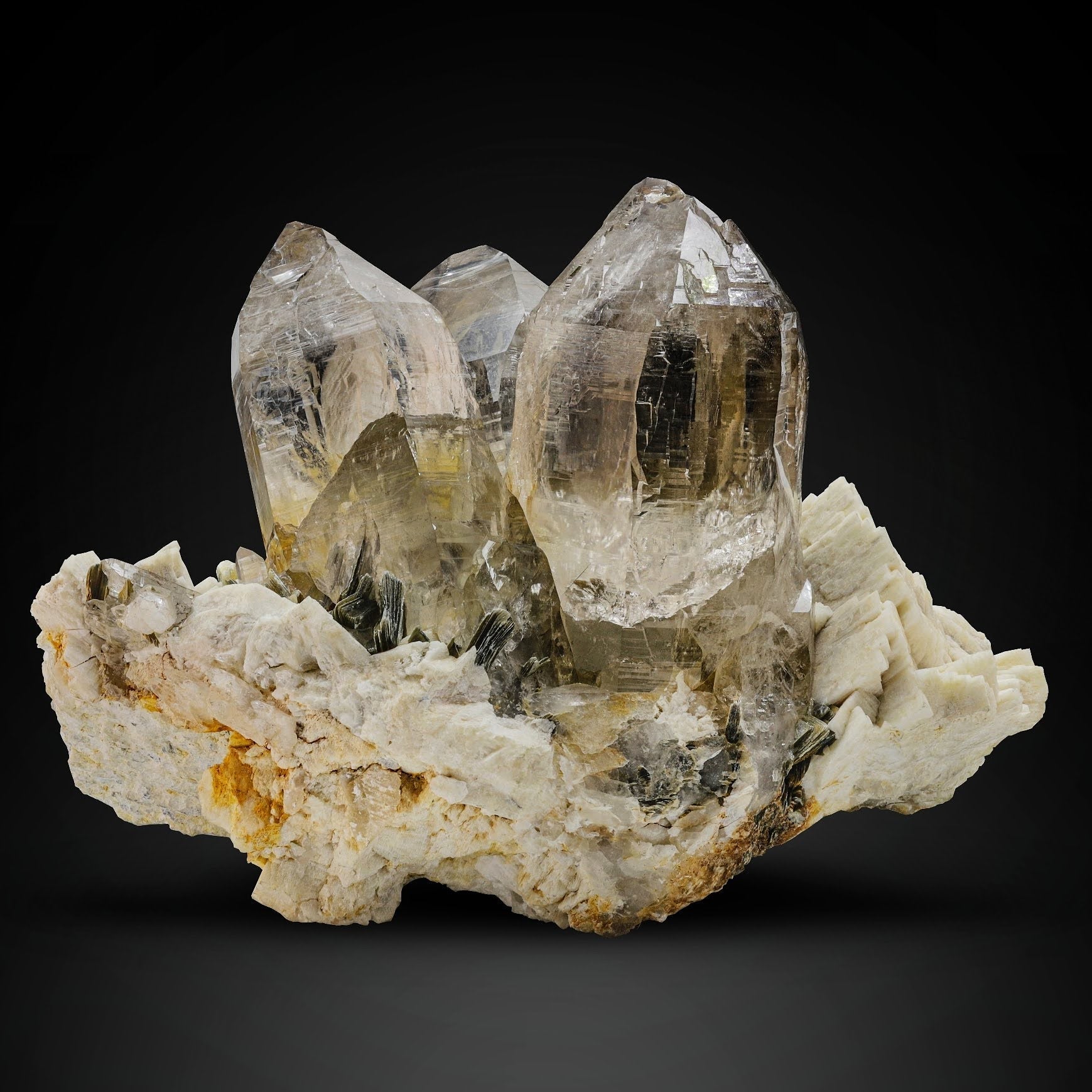 Huge vibrant smoky color gem Quartz crystals on Feldspar from Pakistan