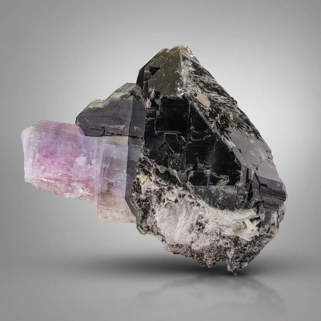 Pink Kunzite crystal nicely perched on Smoky Quartz from Afghanistan