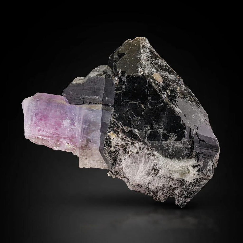 Pink Kunzite crystal nicely perched on Smoky Quartz from Afghanistan