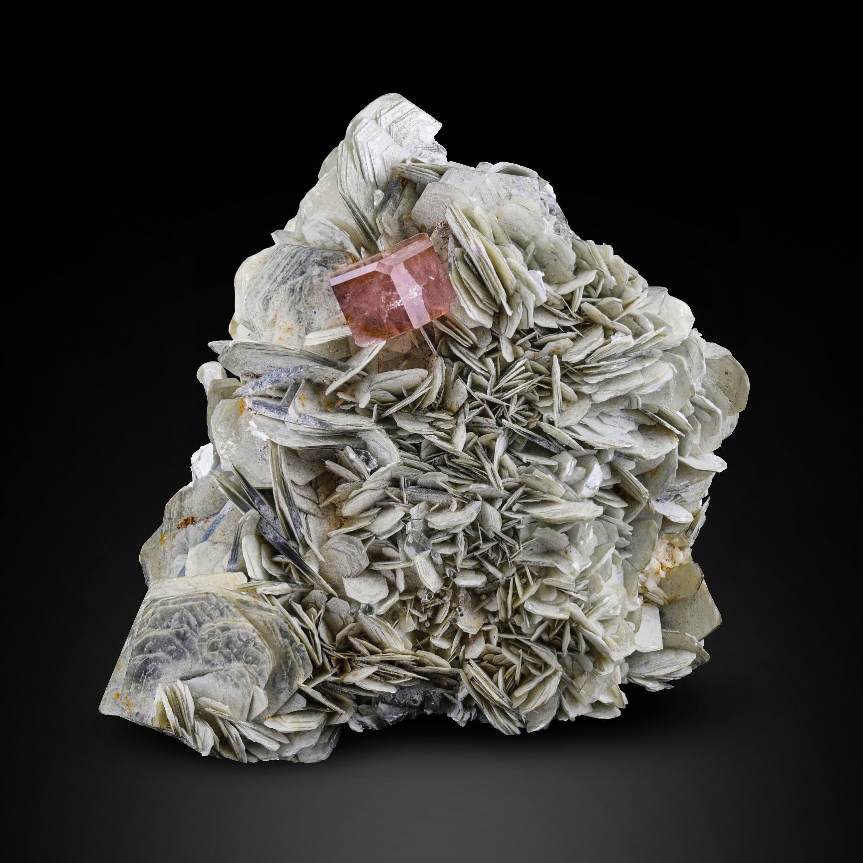 Glassy Pink Apatite crystal on Muscovite Mica Minerals from Pakistan