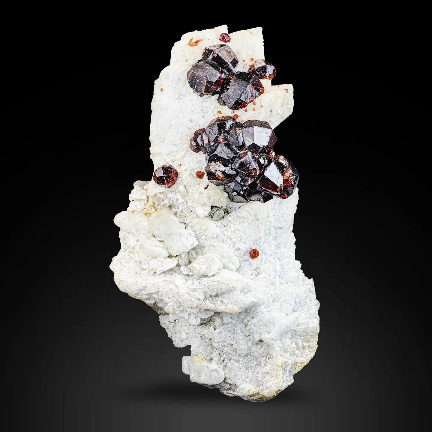 Group of Spessertine Garnet Crystals on Albite Muscovite from Pakistan