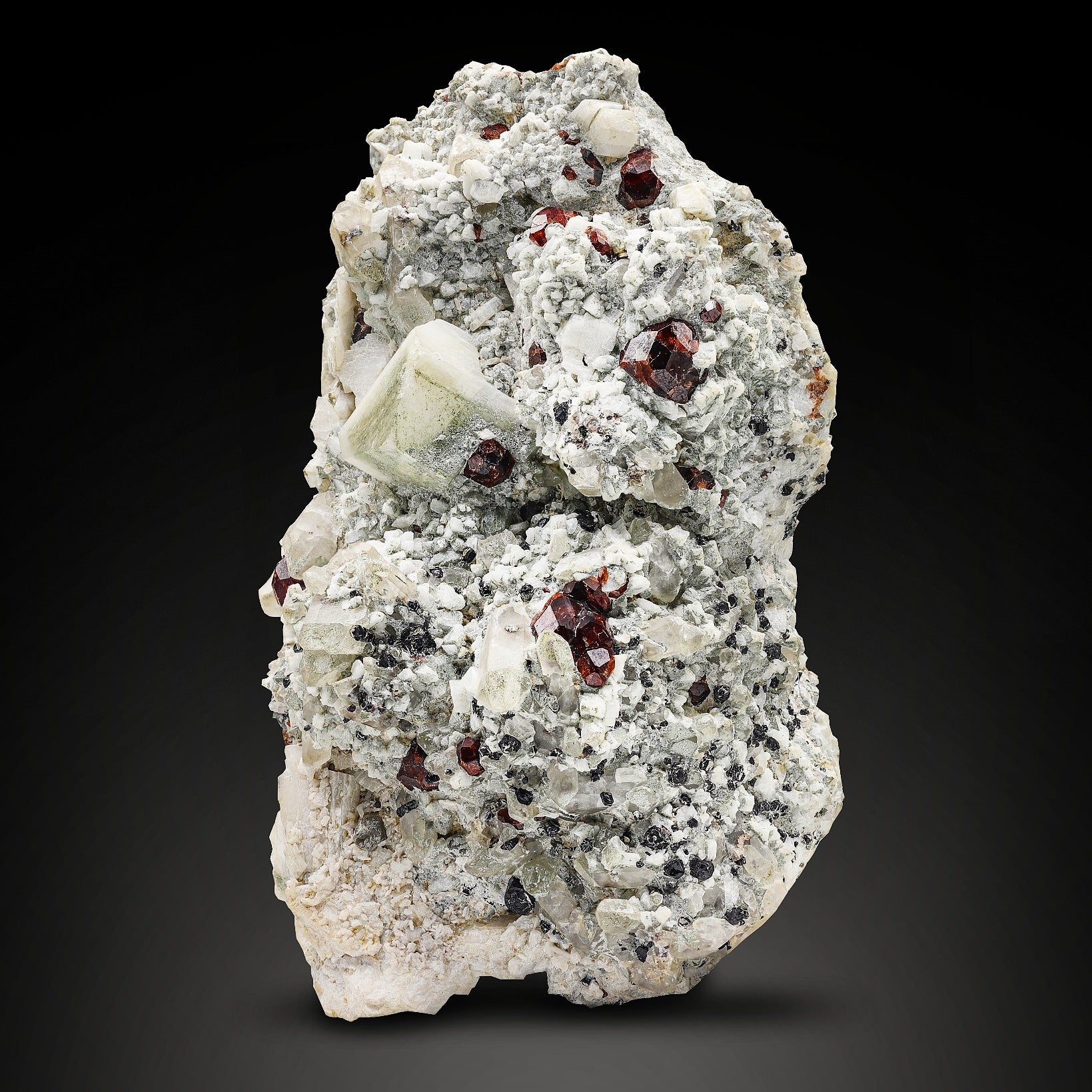 Vibrant red Spessartite Garnet crystals on Albite Specimen from Pakistan