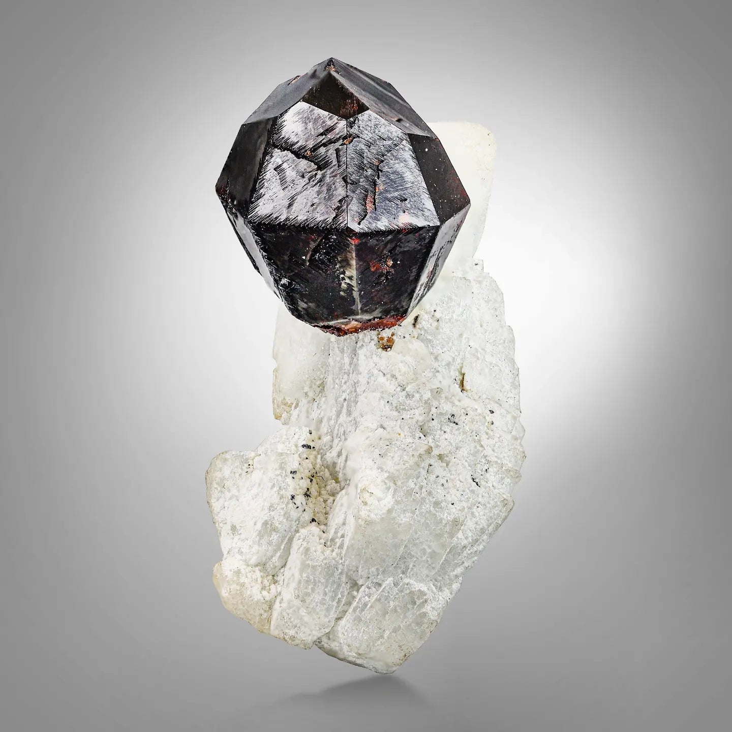 Group of Spessertine Garnet Crystals on Albite Muscovite from Pakistan
