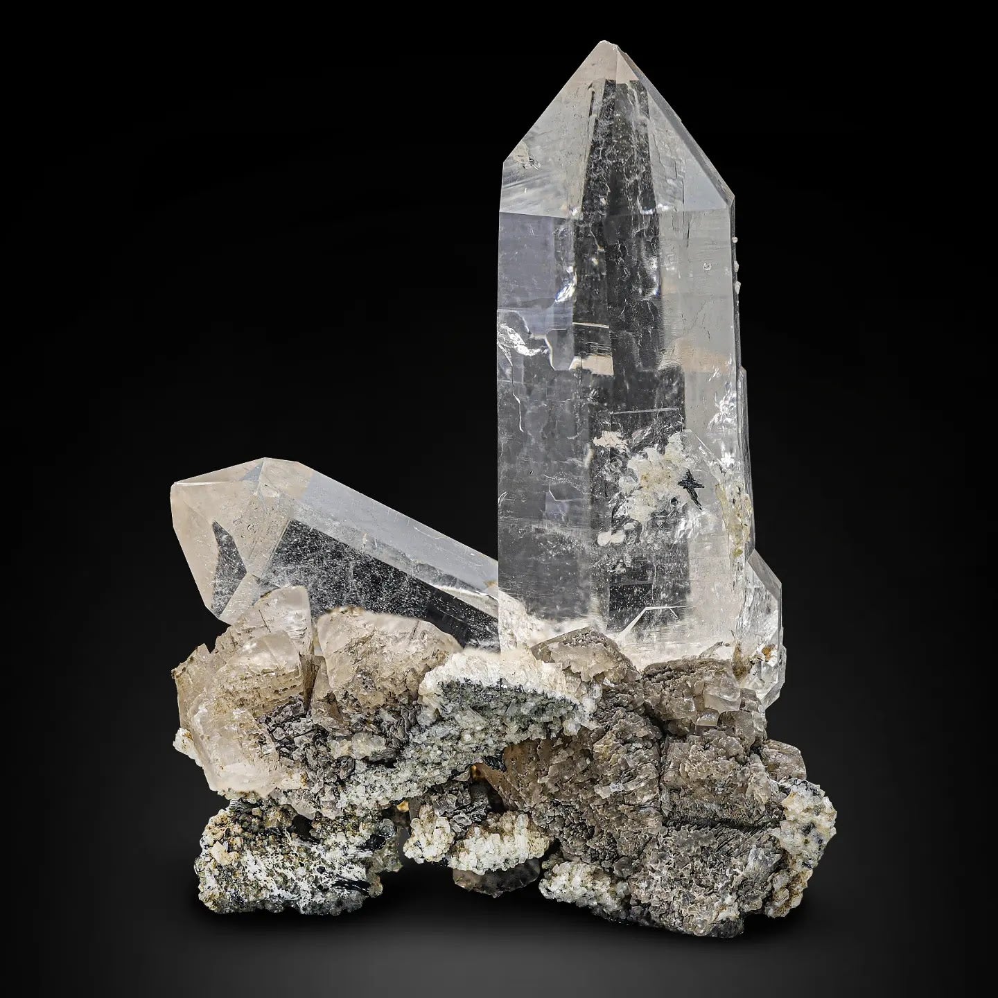 Pointed Couple of Quartz Crystals on Calcite