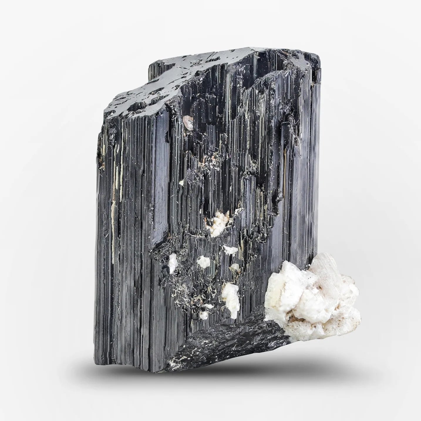 Spessertine Garnet Crystal nicely positioned on Schorl Black Tourmaline from Pakistan