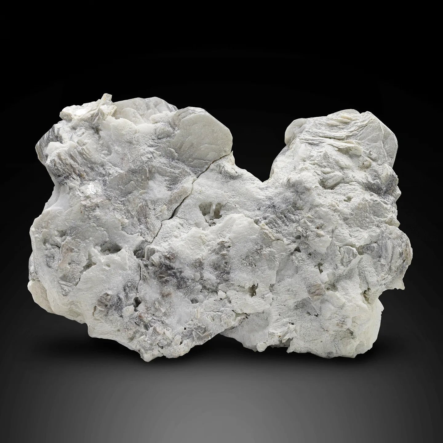 Aggregate of silver-gray color Muscovite Mica rossetts on Albite from Pakistan