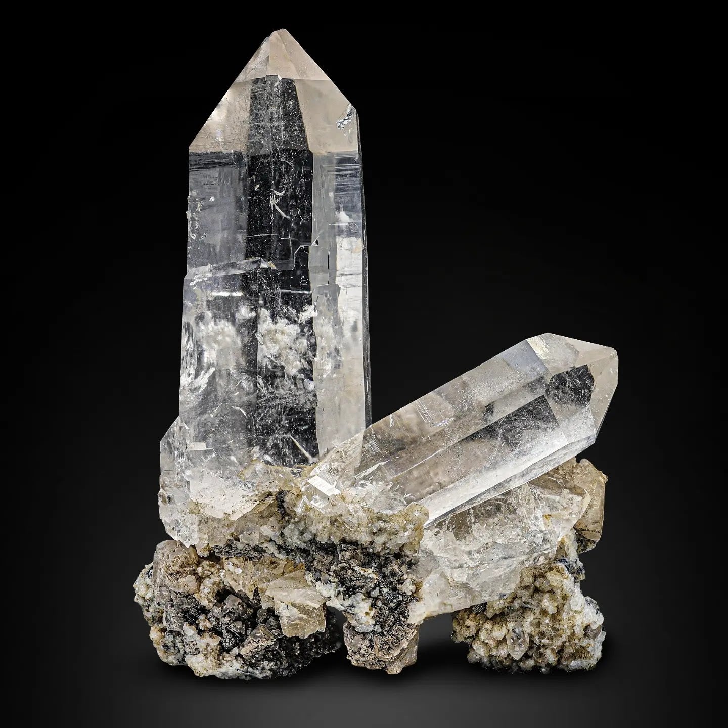Pointed Couple of Quartz Crystals on Calcite