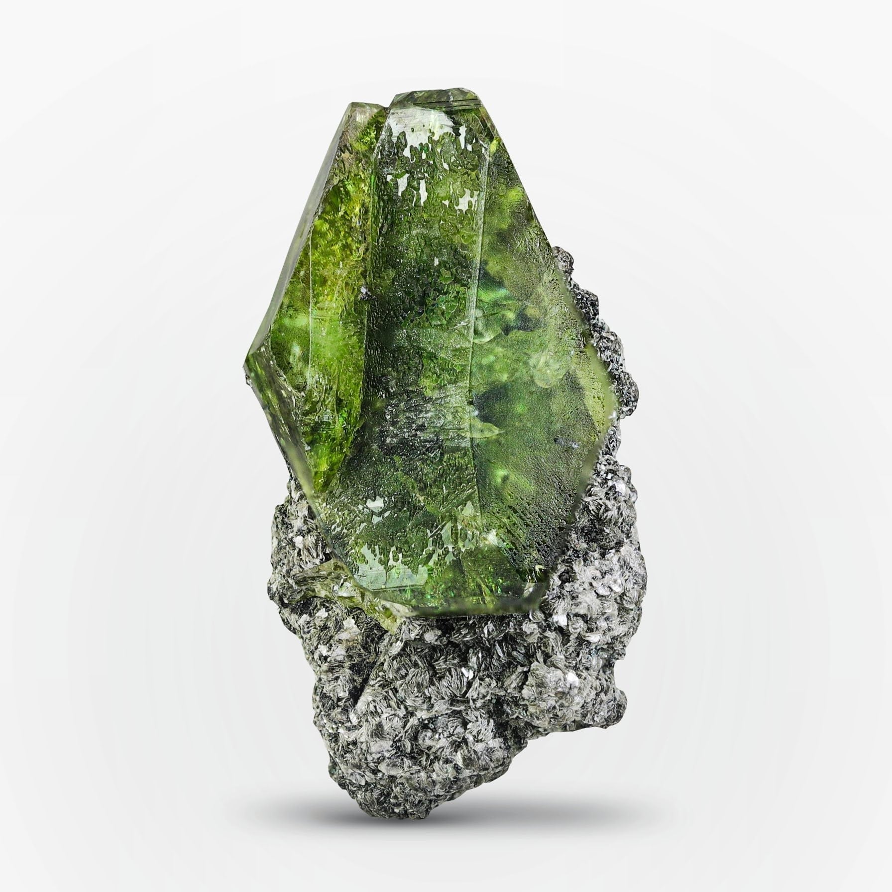 Twinned Green Titanite Crystals On Silvery Matrix From Pakistan