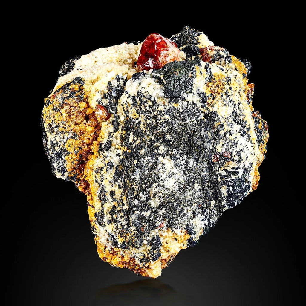 Vibrant Red Twinned Zircon crystals on Graphite matrix from Skardu, Pakistan
