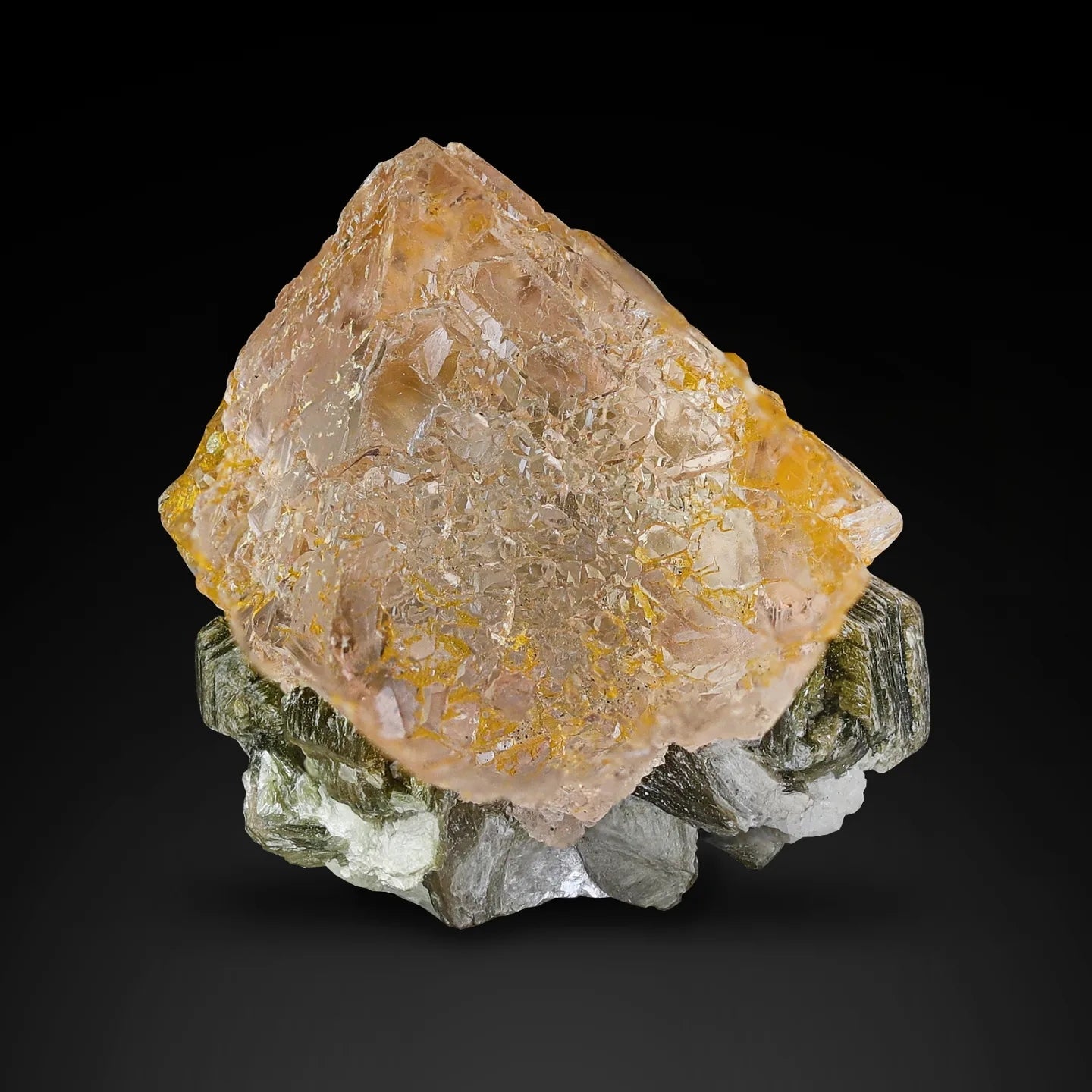 Pink octahedral Fluorite crystal on Muscovite Specimen from Pakistan