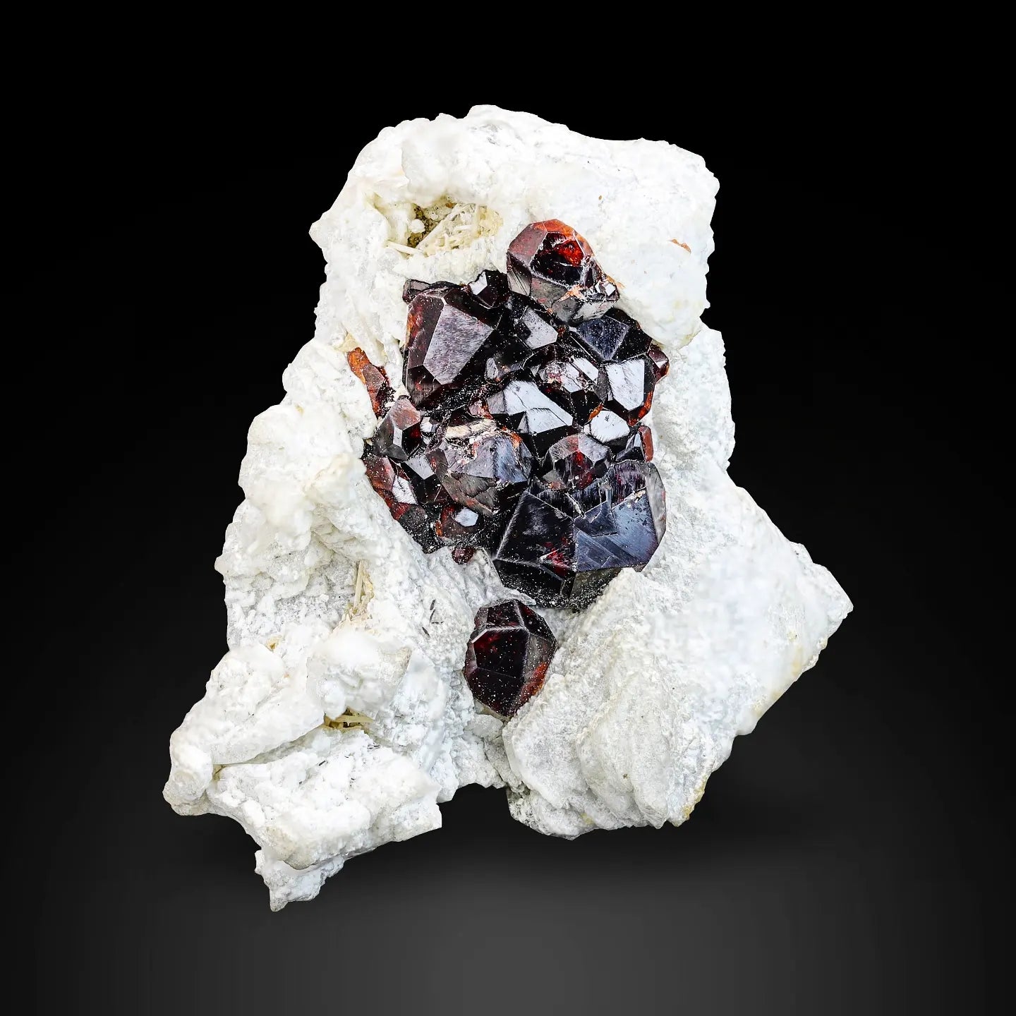Group of Spessertine Garnet Crystals on Albite Muscovite from Pakistan